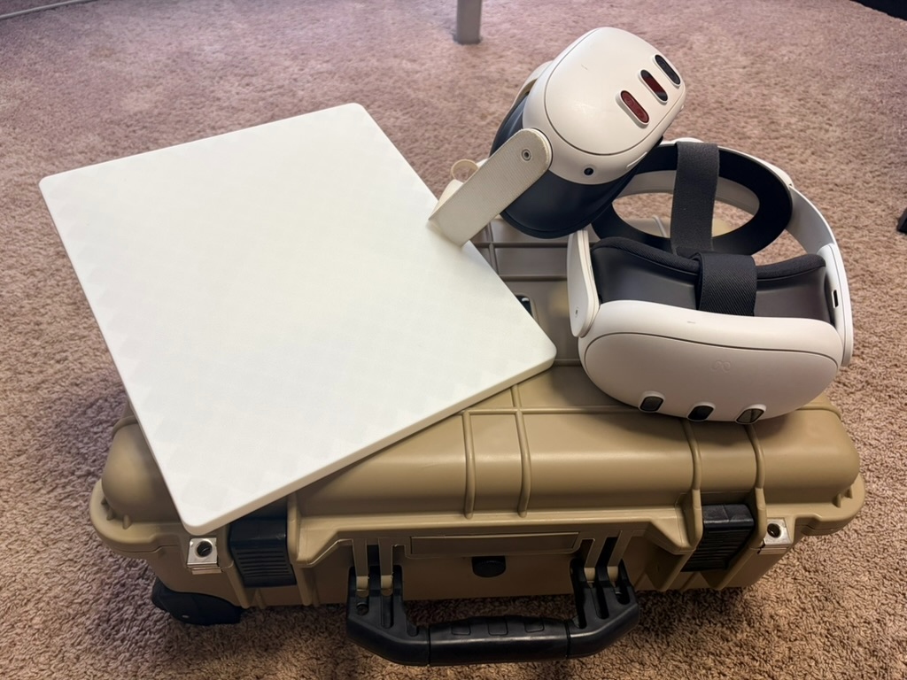 VizworX VOE deployable kit — two Meta Quest 3 headsets and folded XR pad on a rugged transit case